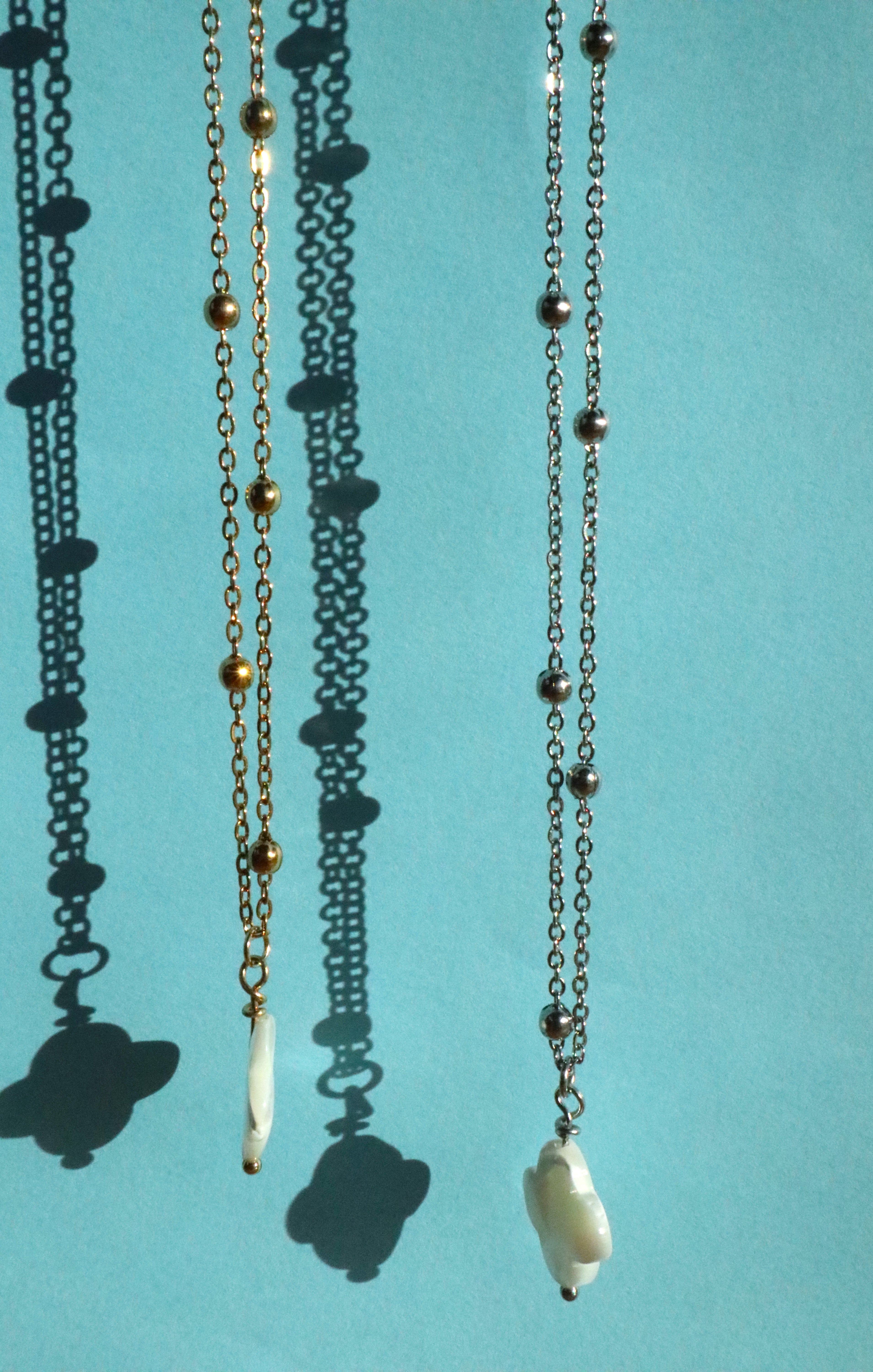 Stainless Steel Mother Of Pearl Clover Pendant Necklace